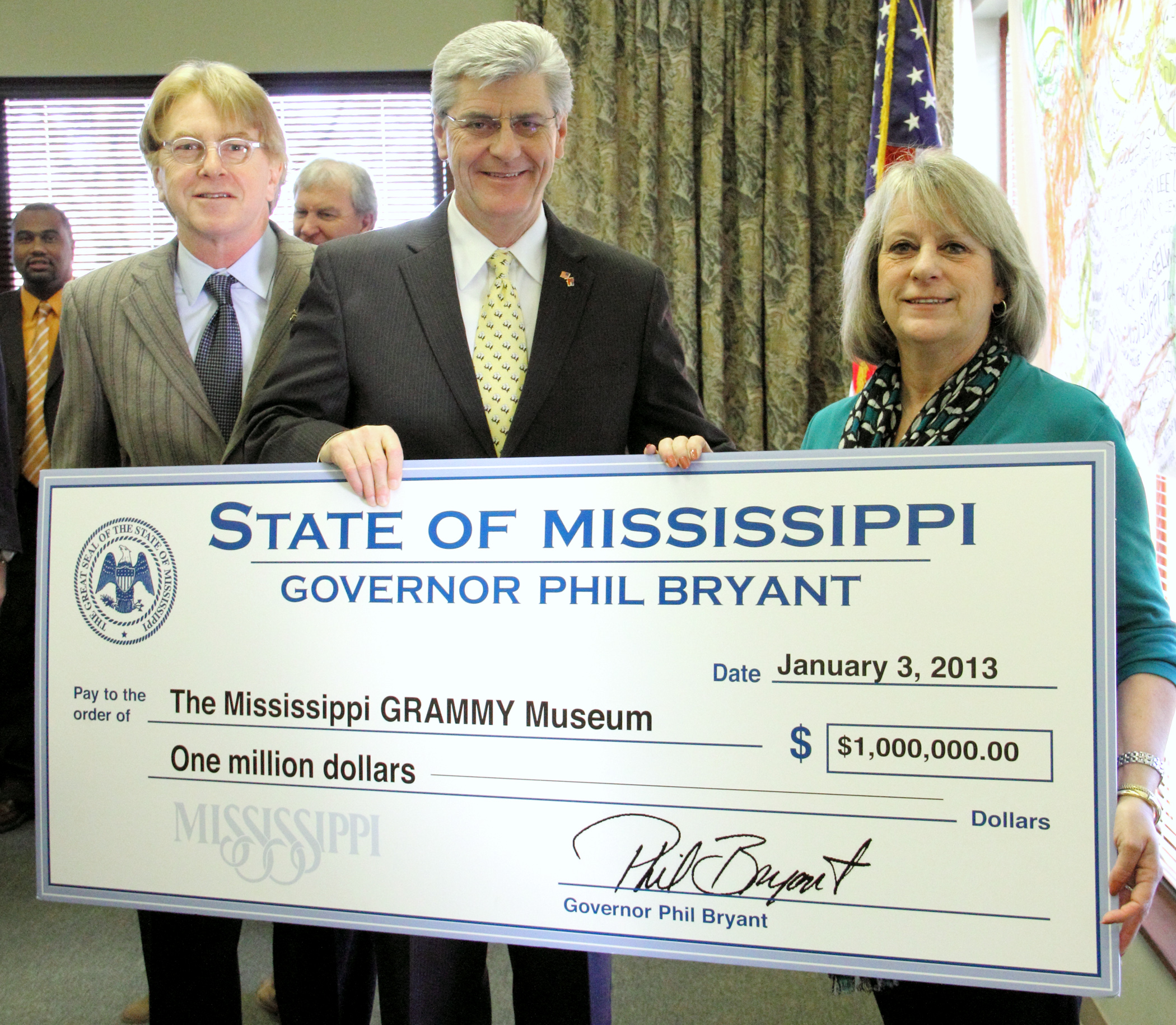 PHOTO:  From left, Jon Hornyak, Sr. Executive Director of The Recording Agency of Memphis, Tenn., Governor Phil Bryant, and Lucy Janoush, President of the Cleveland Music Foundation.